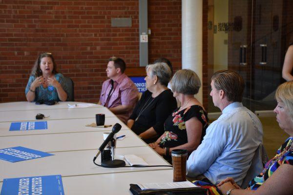 Former Congressman and mental health advocate Patrick Kennedy listens to an attendee of the roundtable discuss issues. PHOTO BY JAKE BULLINGTON | DIGITAL EDITOR