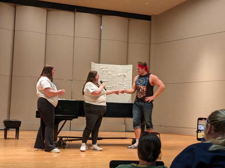 British track and field athlete Adam Phillips names all 50 U.S. states during the talent portion of the ADPi Kinda Guy philanthropy event. Photo by Maria Heath | Staff Writer