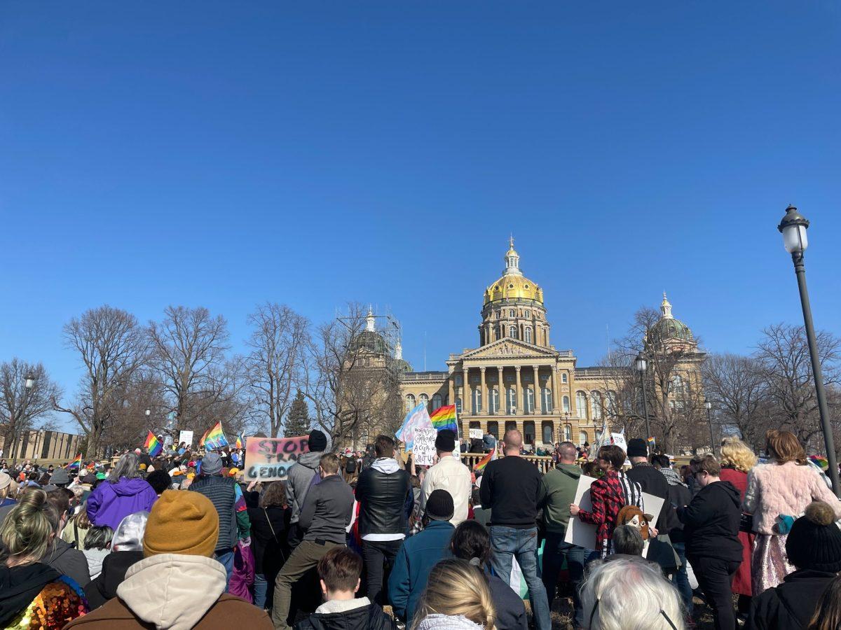 Iowans protesting HF180 and other anti-LGBTQ+ legislation outside the capitol on Sunday. Photo by Meghan Holloran | Digital Editor