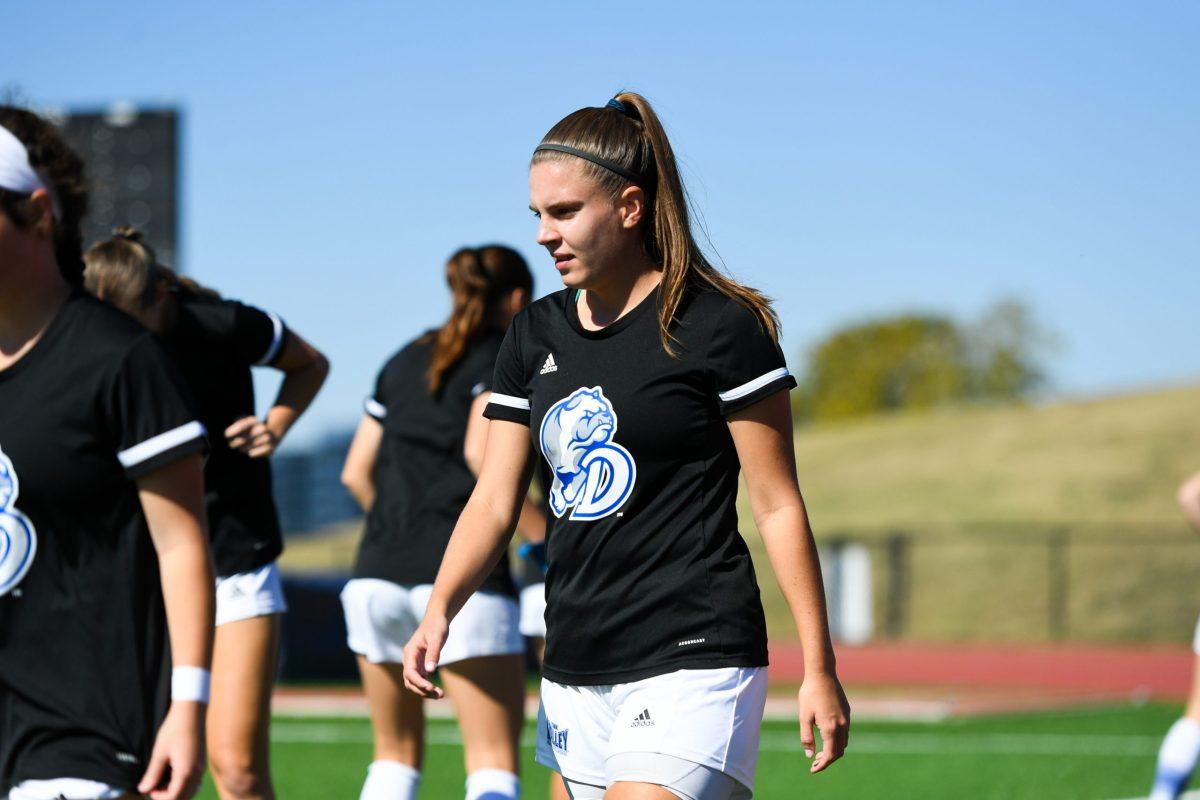 Laura Riesenbeck in her Drake warmup kit.