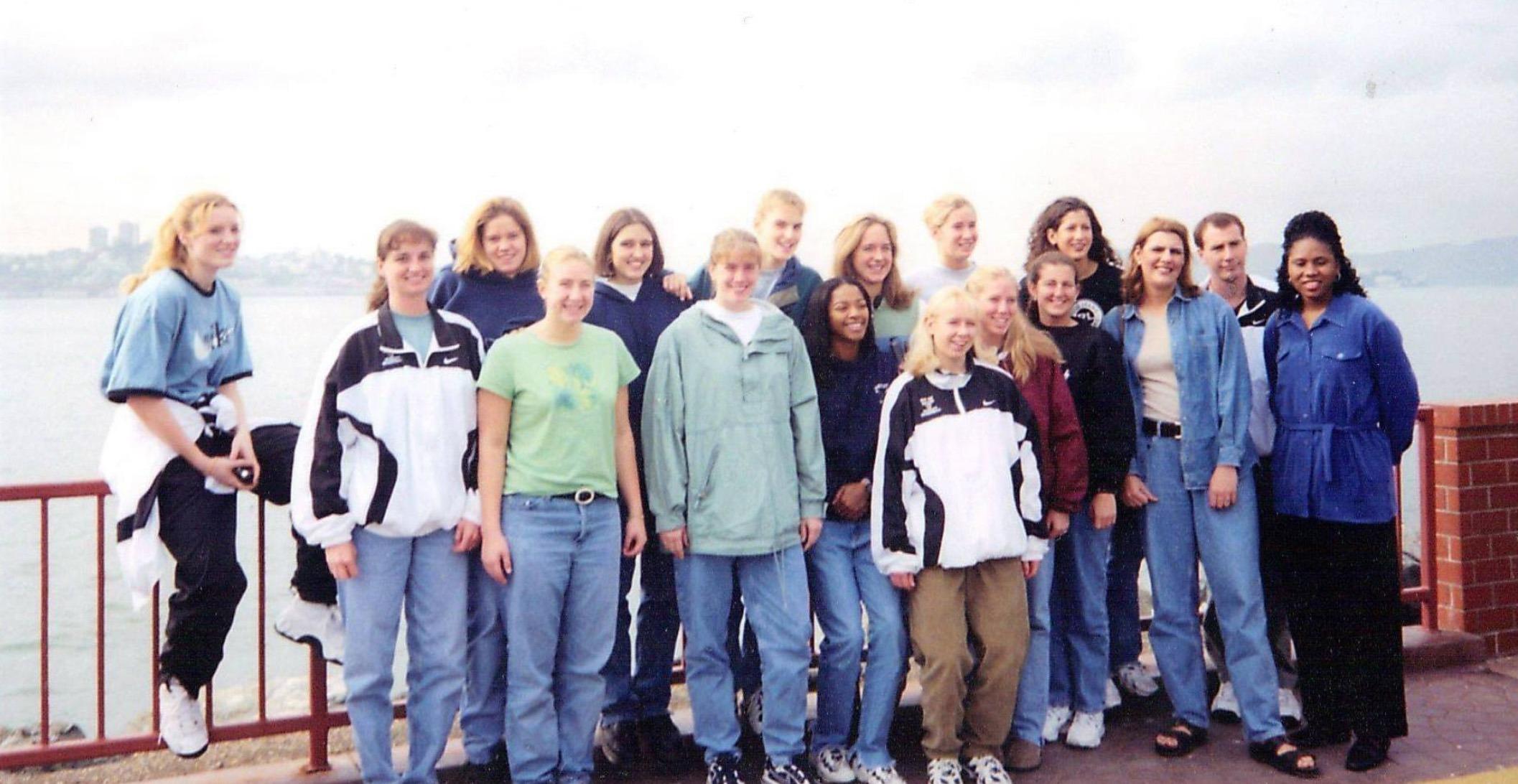 student athletes and Kelly Bruhn pose in San Francisco in the 90s.