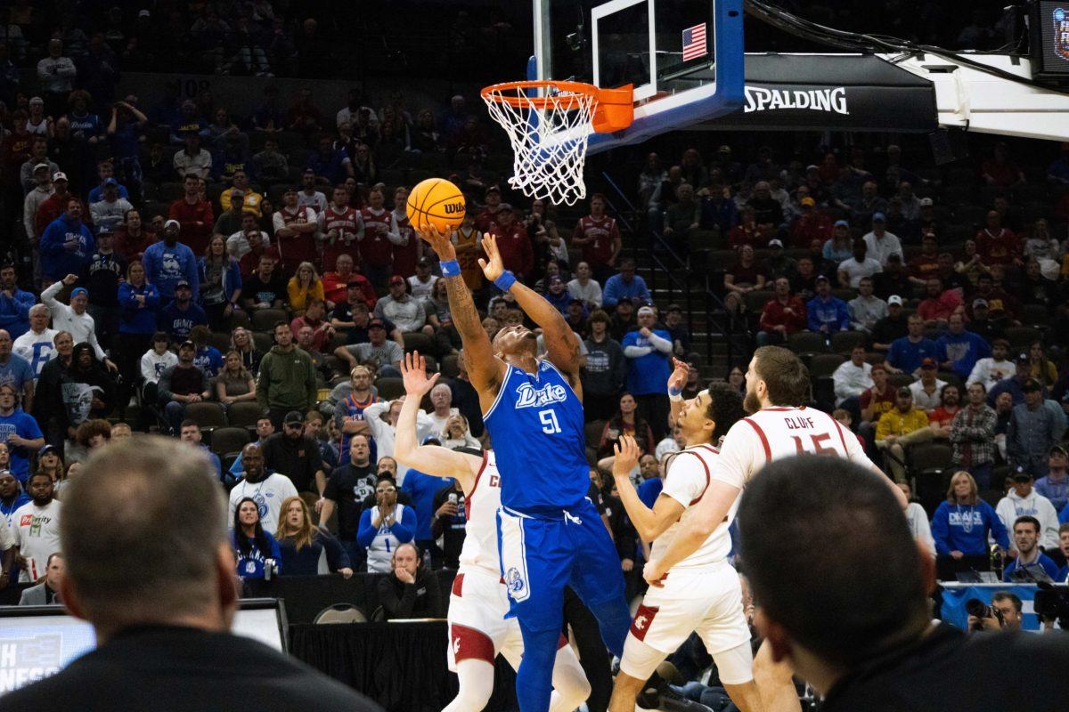 Darnell Brodie, Drake Men's Basketball starting forward shoots for the hoop