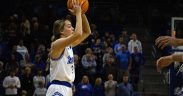 Drake Women's Basketball player looks for a pass