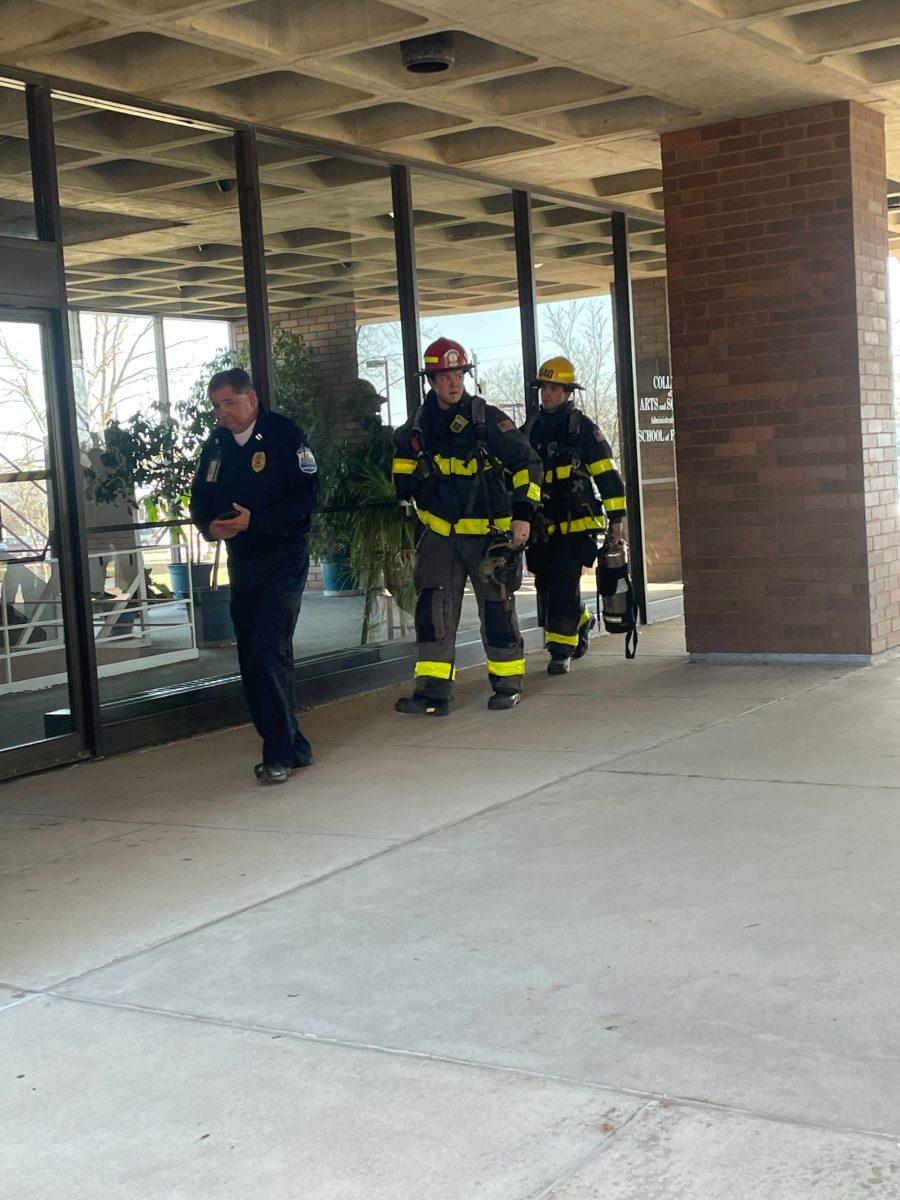 Firefighters appearing outside the east side of the Fine Arts Center. Photo by Leannah Choi | Staff Writer