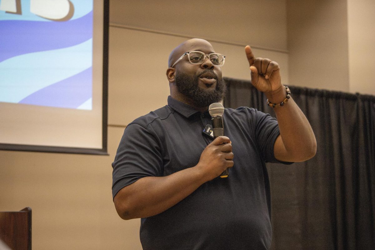 District 34 state house candidate Rob Johnson speaks to young voters at the fall 2024 kick off meeting of the Drake Democrats.