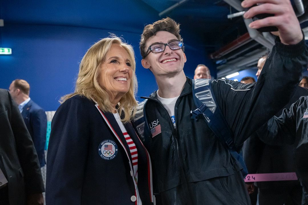 Steve Nedoroscik, the two-time Olympic medalist and internet sensation, posed for a selfie with First Lady Jill Biden, who was in attendance at the 2024 Paris Olympic Games.  Photo courtesy of Wikimedia.