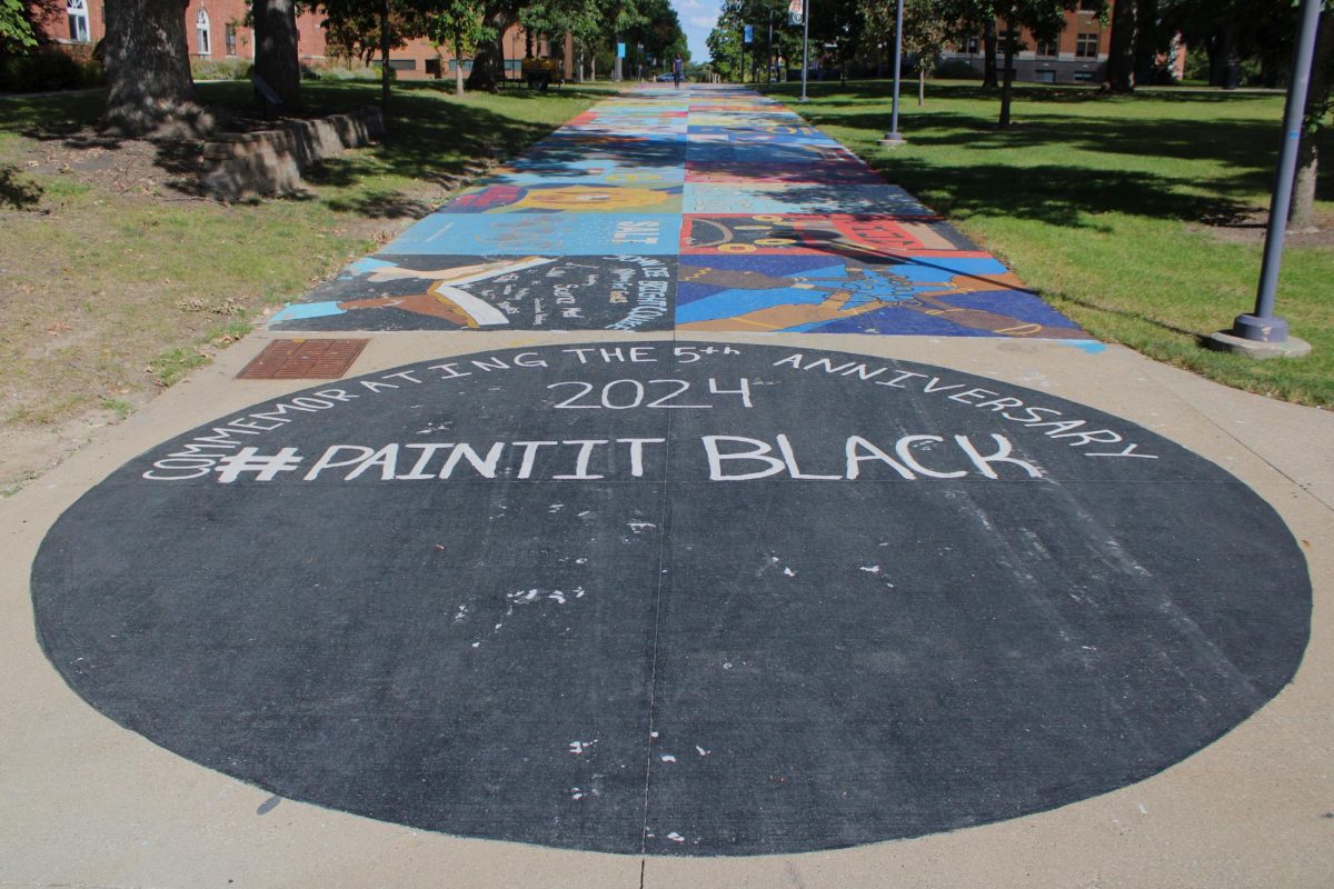 The #PaintItBlack circle on Painted Street remains unsigned after weather prevented students from participating in the Relays tradition last spring. CBS will hold the traditional signing of the circle in spring 2025. 