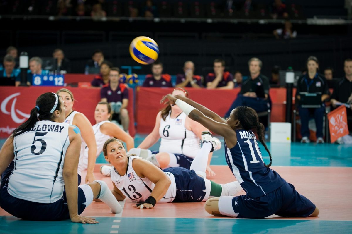 Team USA libero Sydney Satchell makes an impressive dig during the U.S. - China Exhibition game during the 2012 Paralympic Games. Photo courtesy of Wikimedia