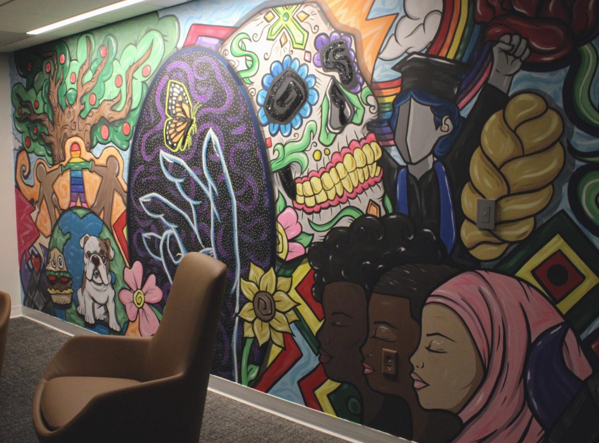 A mural echoes President Marty Martin’s assertion that Drake will support all students in the face of changes to Iowa’s civil rights code. 