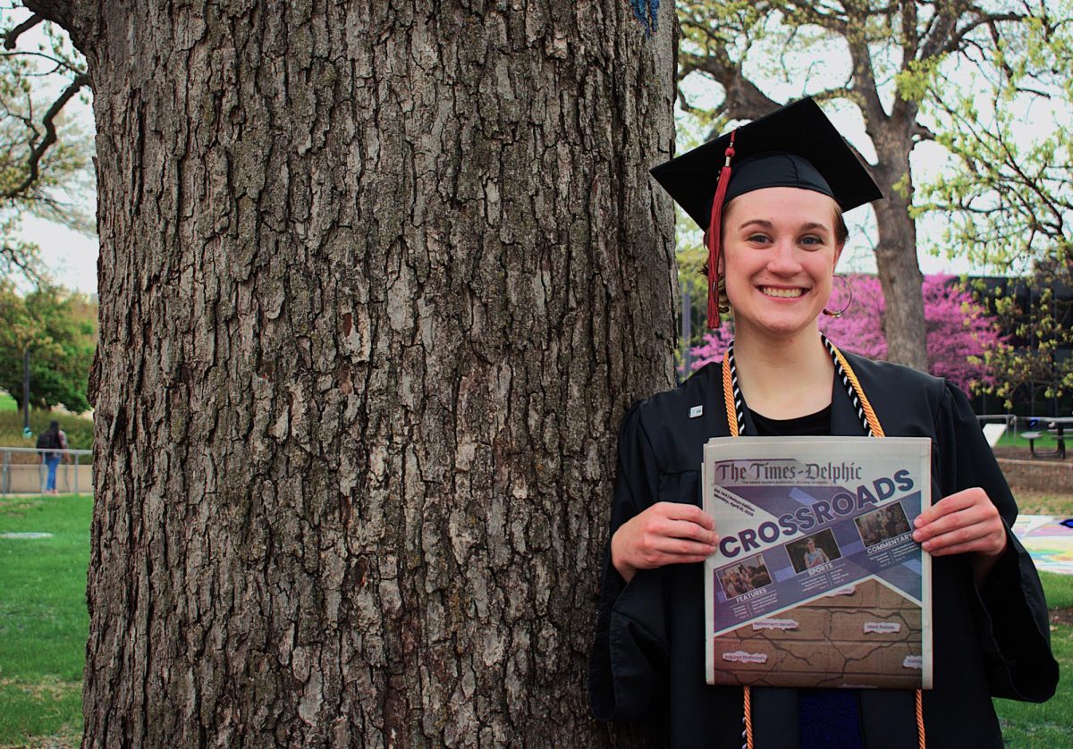  Outgoing Editor-in-Chief Mack Swenson holds a copy of this year’s Relays edition. They’re proud to contribute to a growing body of journalism that informs and inspires. Photo Courtesy of Madeline Streepy.