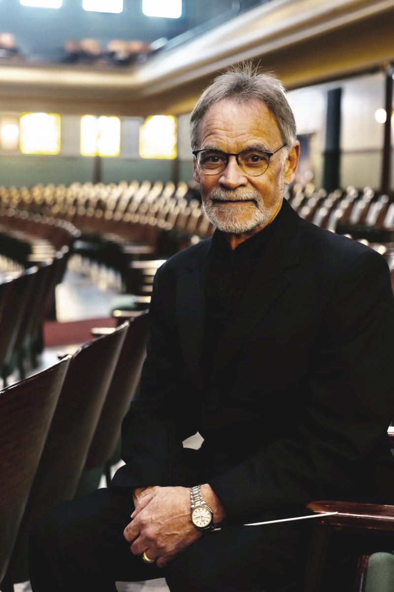Robert Meunier is preparing to step down from the director of bands position. Students spanning decades say he has had a great impact on their lives. Photo courtesy of Drew Clements