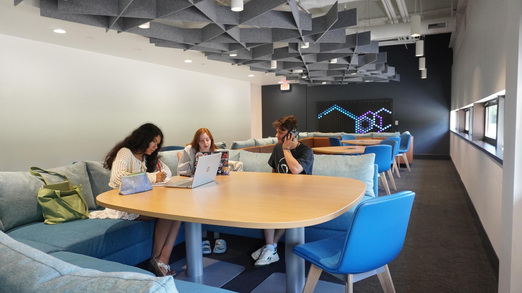 Students utilize the new couch and study spaces added to the Olmsted Center.
