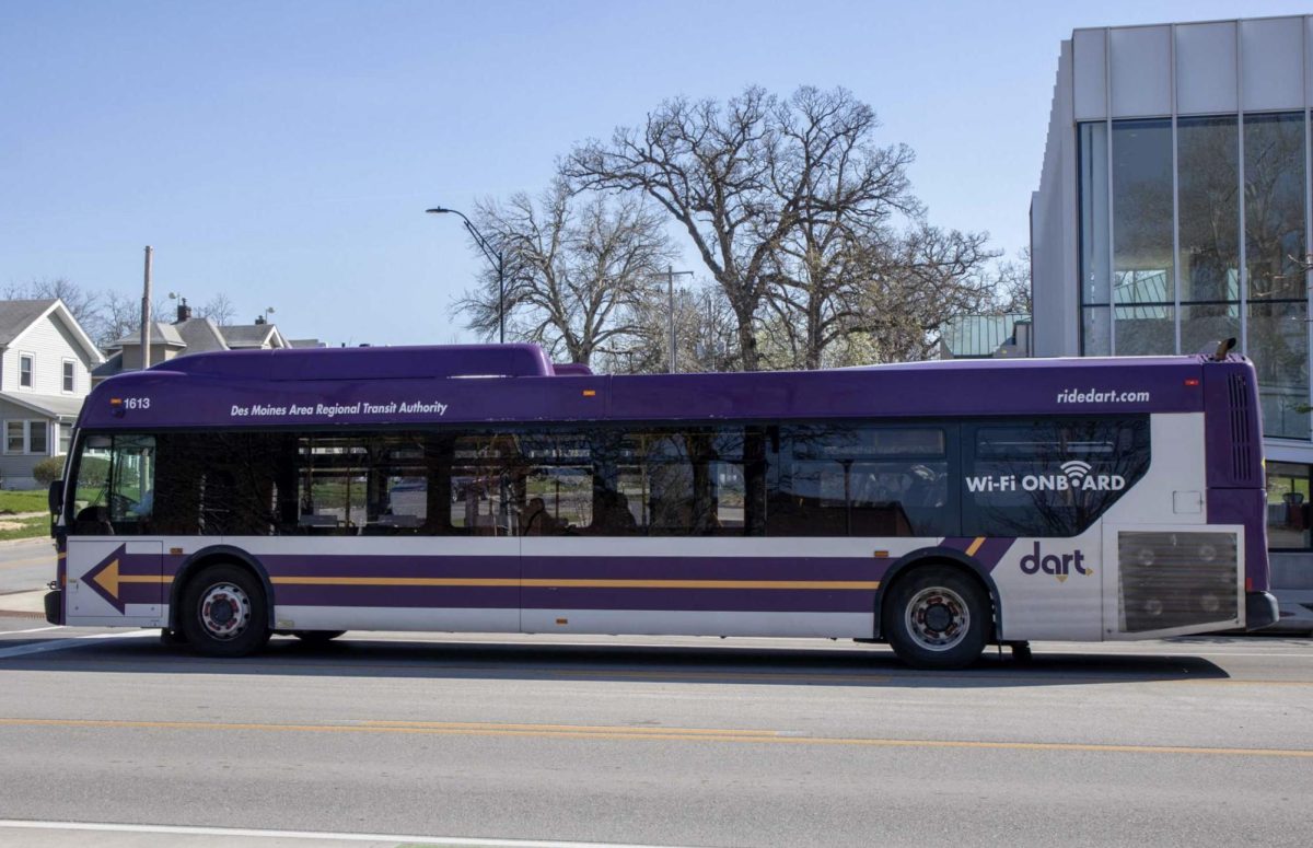 A DART bus waits at a stoplight at the intersection of 28th Street and University Avenue. Buses 3 and 60 currently drive along this route each day.