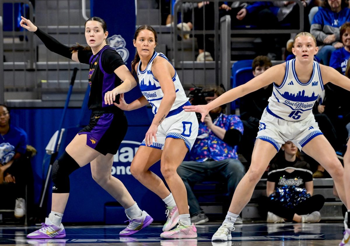 Drake women’s basketball players Brooklin Dailey and Maggie Taylor take on the University of Northern Iowa’s offense in the Knapp Center on Feb. 1.  Photo courtesy of Ginnie Coleman
