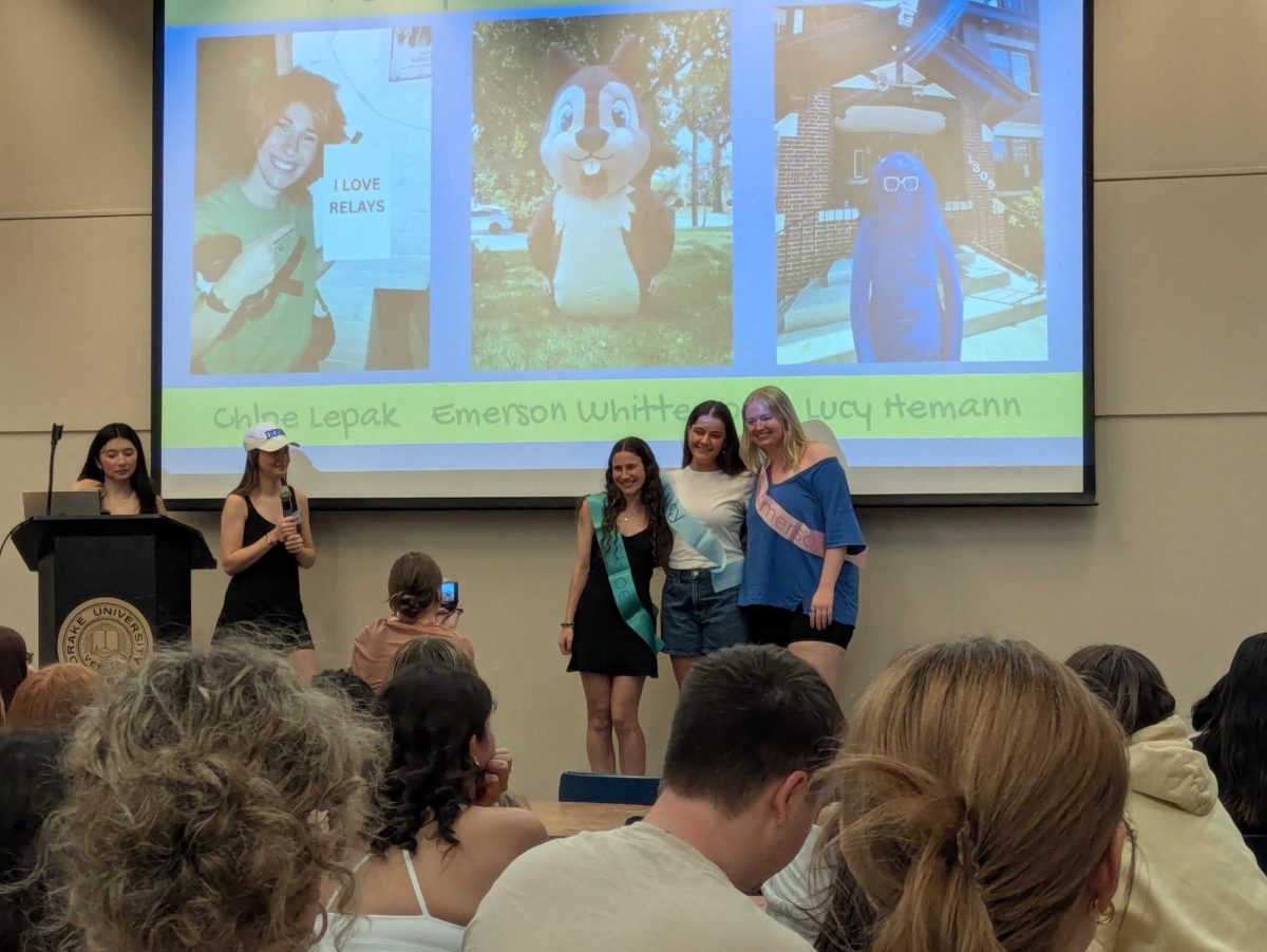 Seniors Chloe Lepak, Lucy Hemann and Emerson Whittemore pose for a photo together March 30 in Parents Hall after being announced as the 2026 Relays hosts.