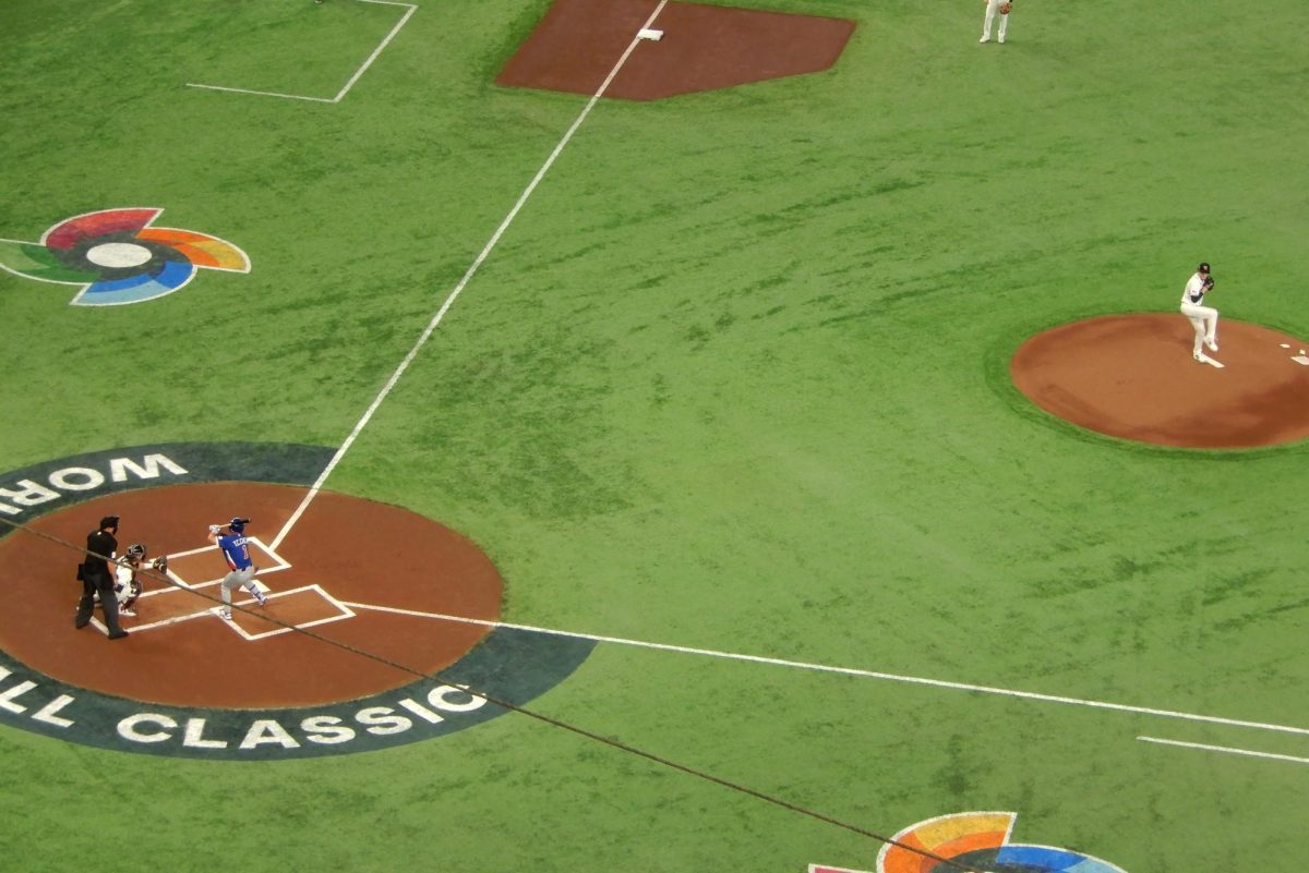 A pitcher prepares to throw in the classic pool C game 5 of the 2026 World Baseball Classic. The U.S. team this year fell to Venezuela in the finals, with the game ending 3-2. 

"2026 World Baseball Classic Pool C Game 5" courtesy of ウィ貴公子 via Wikimedia