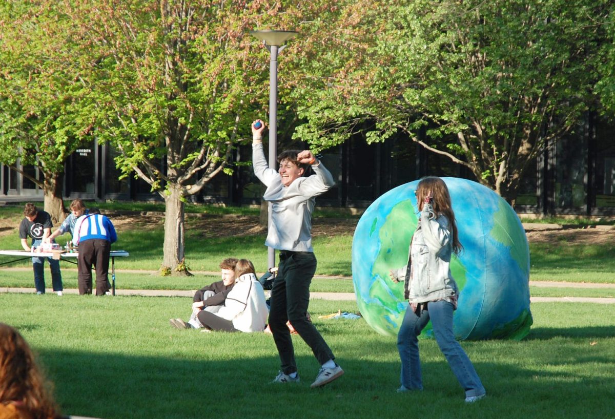 Students gather at Helmick Commons at Earth Jam 2025. DEAL’s student-led event combines sustainability with community to spread environmental awareness. Photo courtesy of Allie Raines
