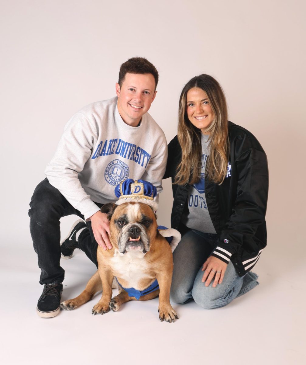 Kayla Armstrong and Cole Henry pose with their dog Milo, the 2025 Beautiful Bulldog winner. Photo courtesy of Kayla Armstrong 