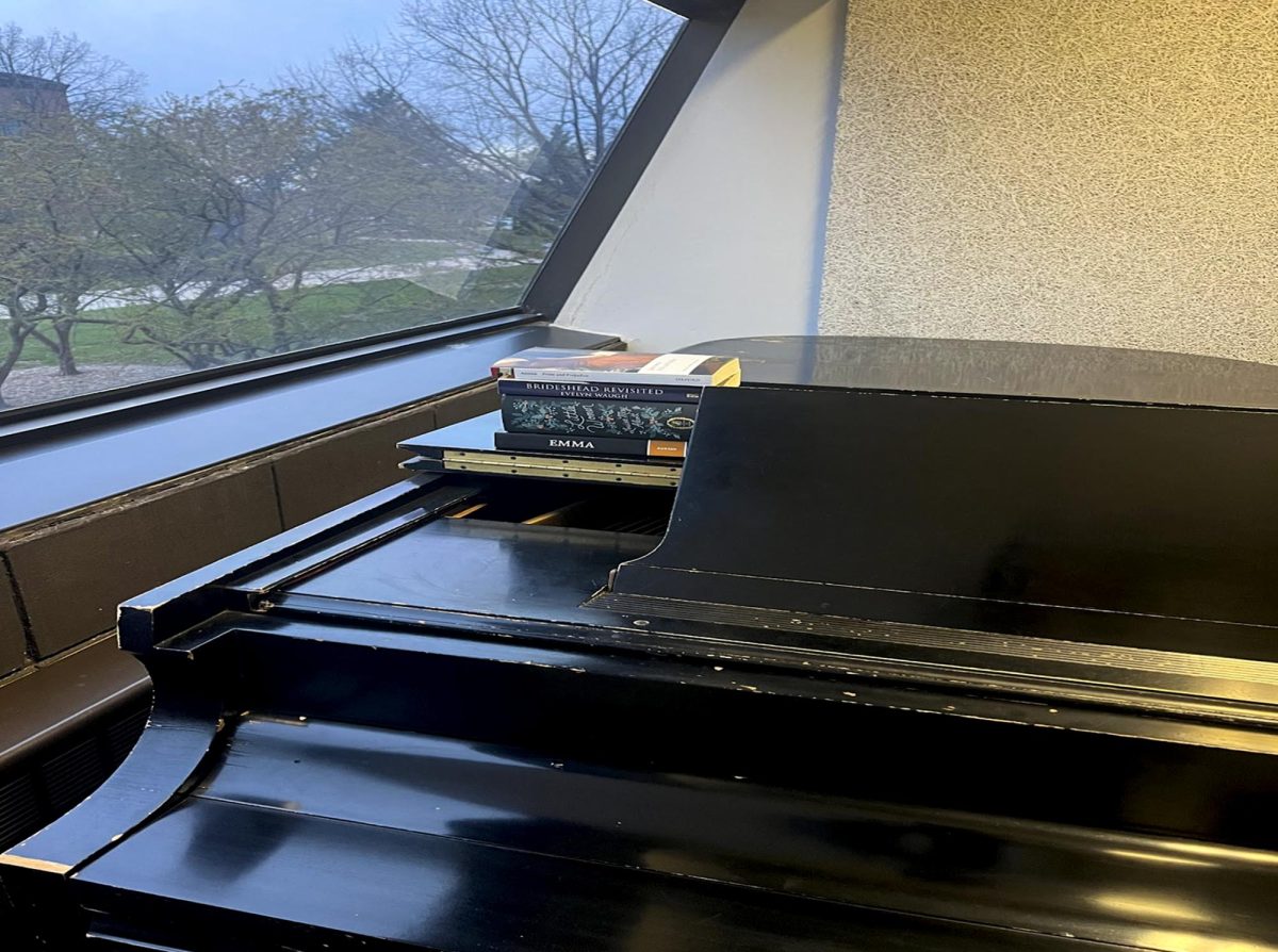 A piano and stack of books, pictured here, would have been a common sight at gatherings of Drake University’s early literary societies. Many focused on the sharing and discussion of music and literature.