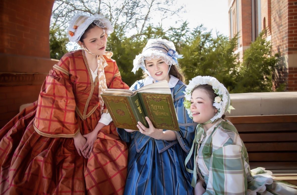 Madison Green (Marmee), Savannah Fisher (Jo) and Abby Raper (Amy), read together in a promotional photo for Drake Theatre Arts’ upcoming production of “Little Women.” Photo courtesy of AJ Speck