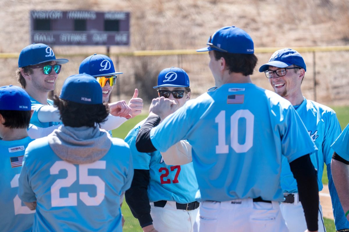 Drake Club Baseball celebrates during a scrimmage against a local men’s baseball team. Photo courtesy of Casey Shanaberger